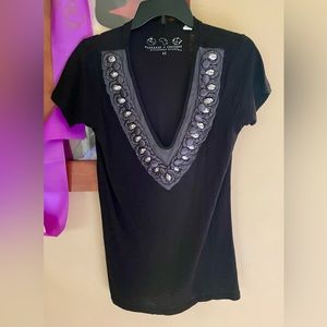 Deep V-Neck Black Top with Boho Detail